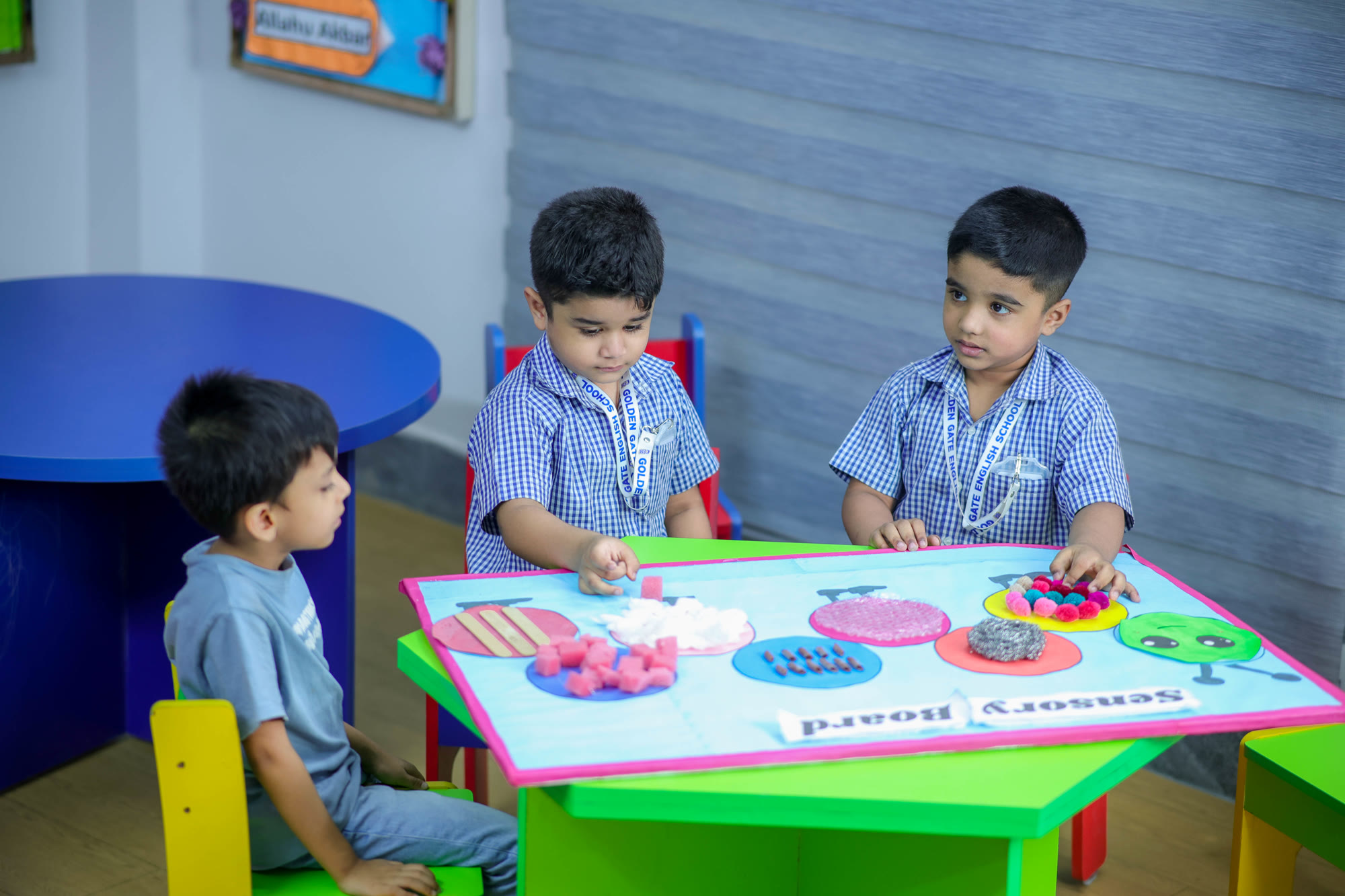 Young students learning together in a bright classroom